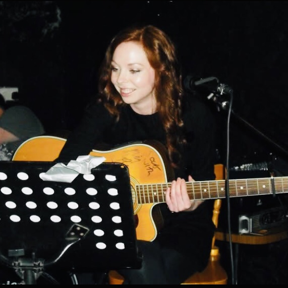 Jo at an open mic